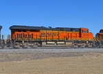 BNSF 6775 also helps churn up the ballast dust